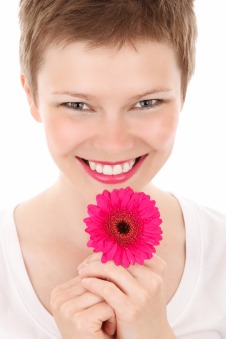 smiling-woman-with-a-flower